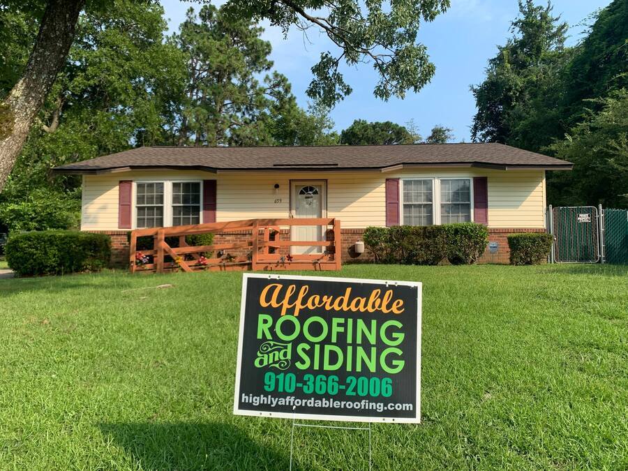Completed new roof on modern cottage β Eastern NC