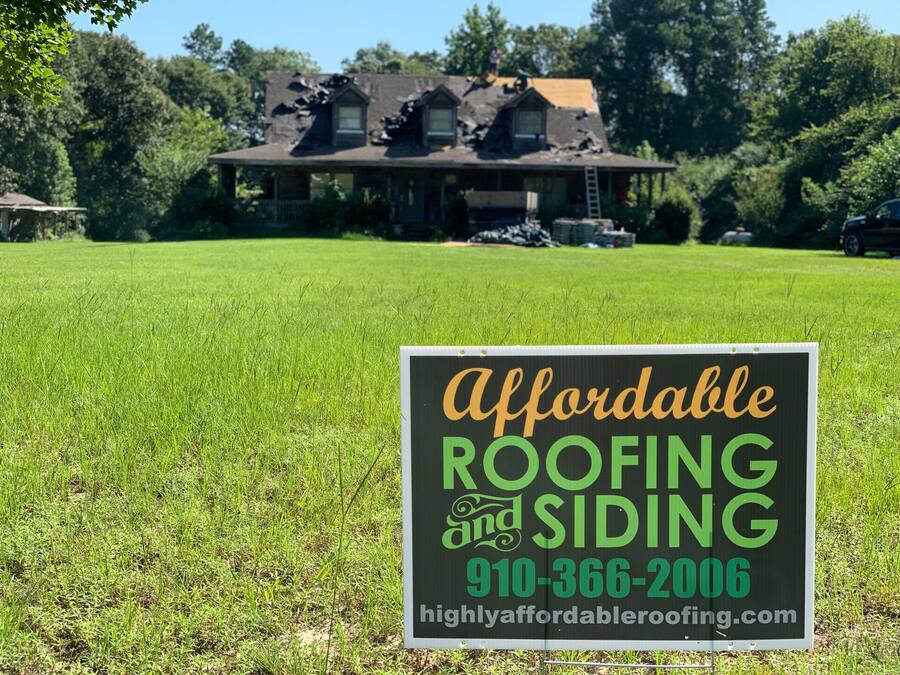 Large colonial home with new charcoal shingles β Eastern NC