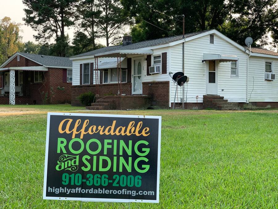 New roof on gray siding home β Eastern NC